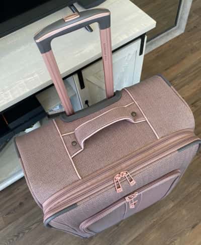 london fog luggage replacement wheels